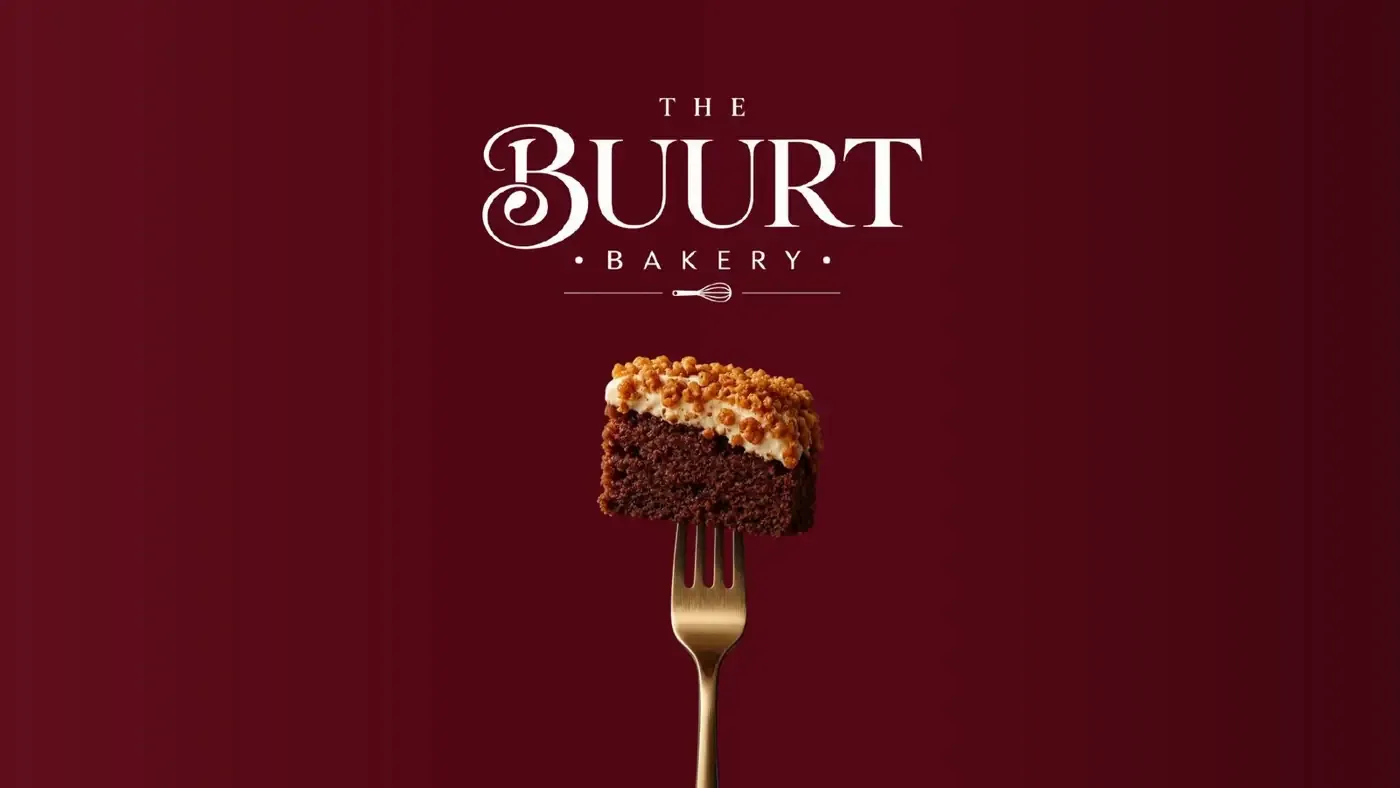 The Buurt Bakery logo above a slice of cake on a gold fork, on burgundy