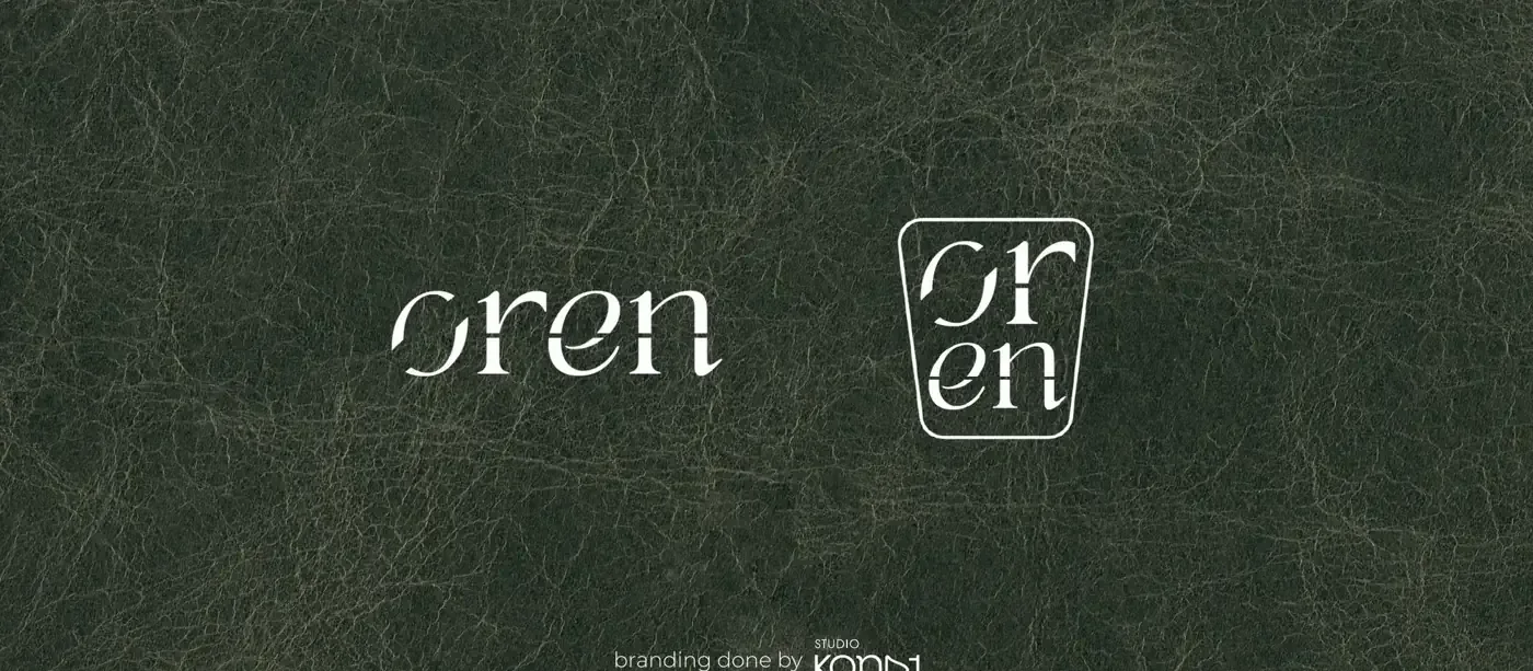Oren wordmark and monogram in ivory on deep forest green texture
