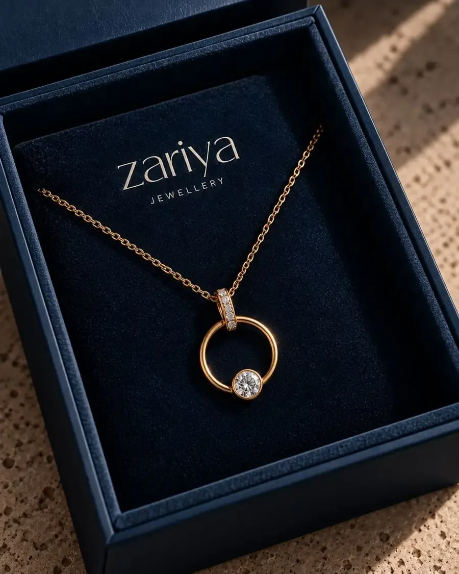 Gold pendant necklace in a navy Zariya presentation box