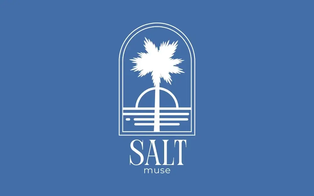 Salt Muse logo in white on coastal blue