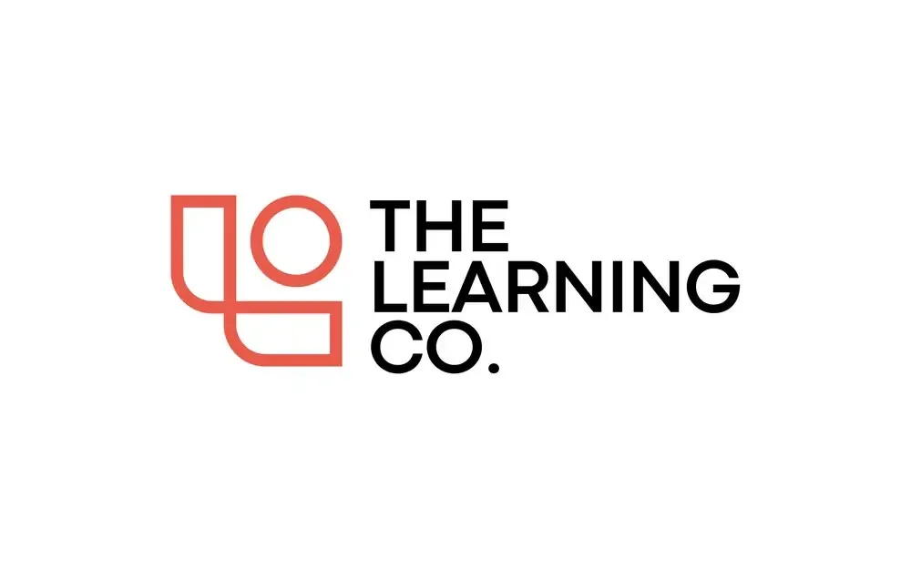 The Learning Co. primary logo in coral and black on white